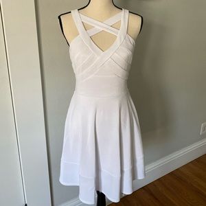 White fit and flare dress with cut outs and mesh